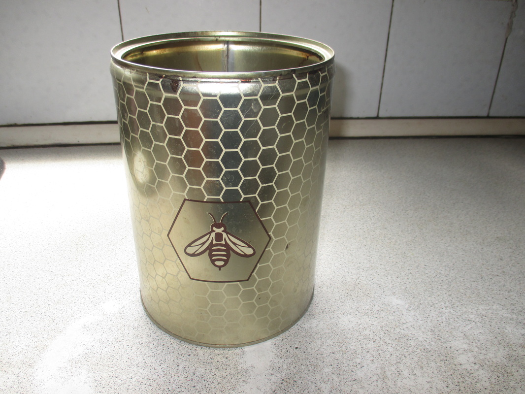 Honey tin, An Imperfect Kitchen Utensil Holder www.theboondocksblog.com
