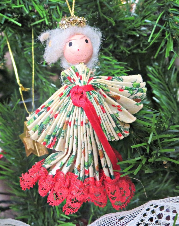 Angel with red lace on Christmas tree The Inspiration for my Christmas tree - The Boondocks Blog
