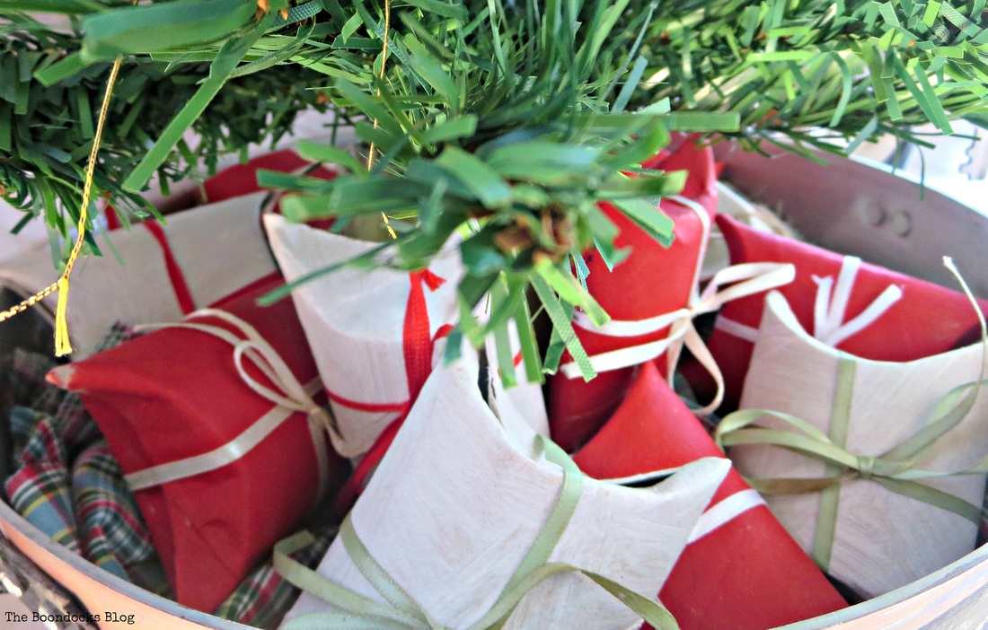 Toilet paper rolls repurposed into candy shaped boxes and placed into a roasting pot The Roasted Christmas Tree - The Boondocks blog