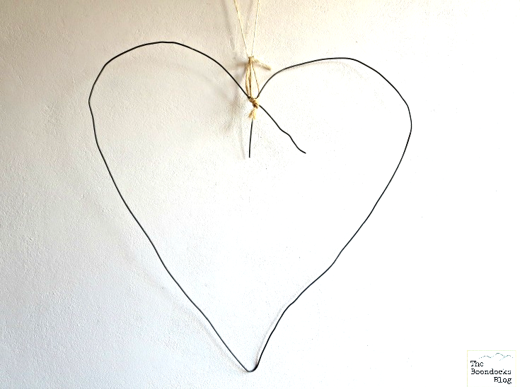 Wire bent in the shape of a heart.