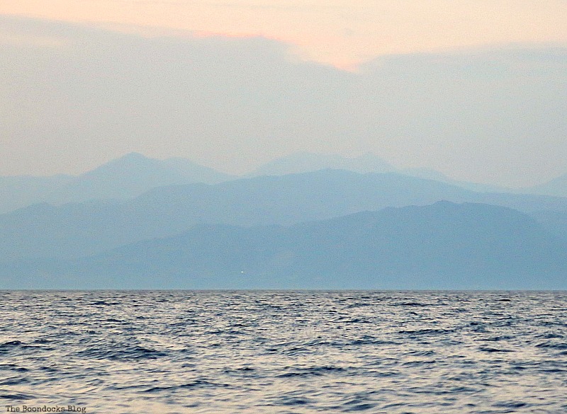 Layers of mountain silhouettes, A Boat Ride into the Sunset www.theboondocksblog.com