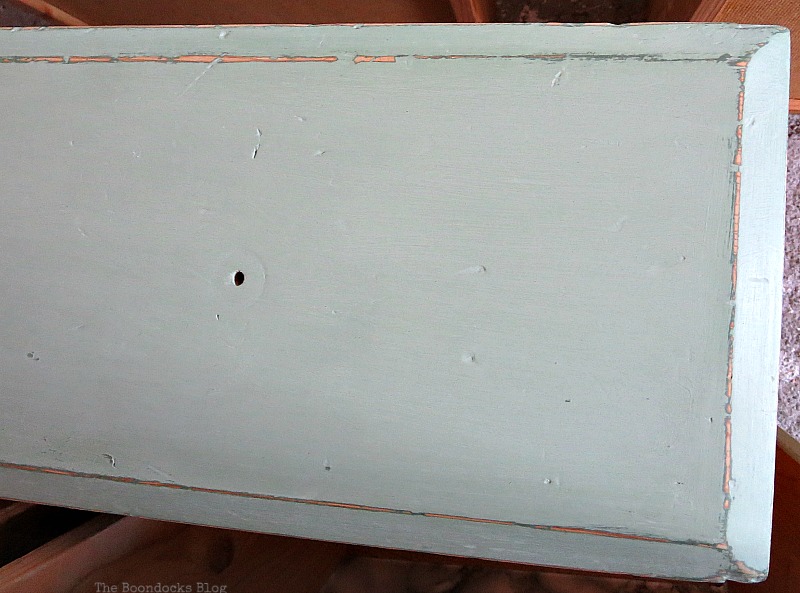 The lighter paint goes on, How to save an Ikea Pine Dresser www.theboondocksblog.com