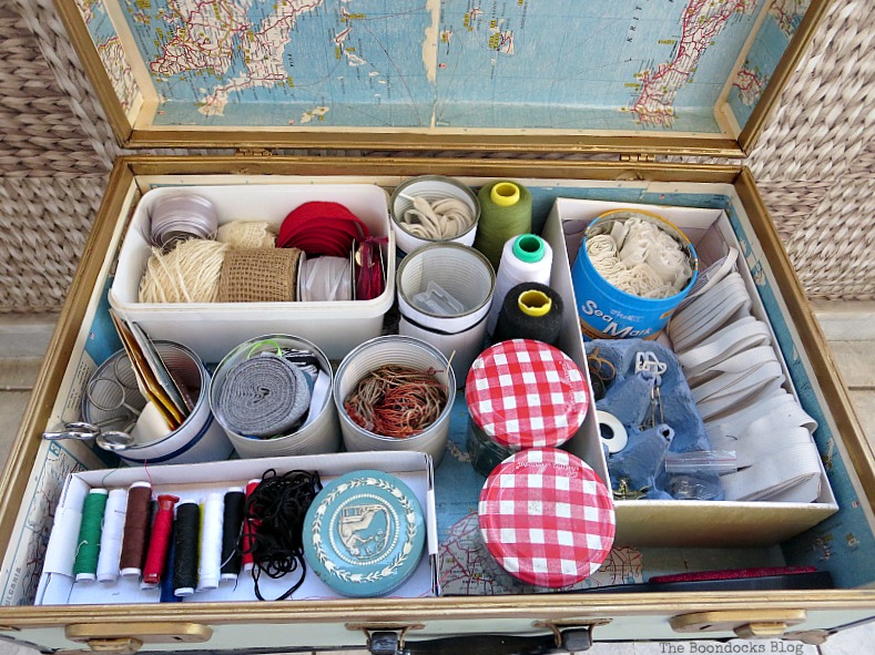 Lots of sewing supplies, What's Inside the Vintage Suitcase? www.theboondocksblog.com