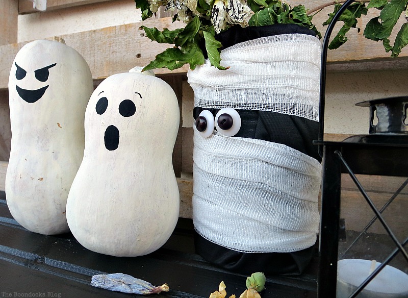 A tea light holder next to mummy and gourds, Fun and Easy Halloween Vignette - Int'l Bloggers Club Challenge www.theboondocksblog.com