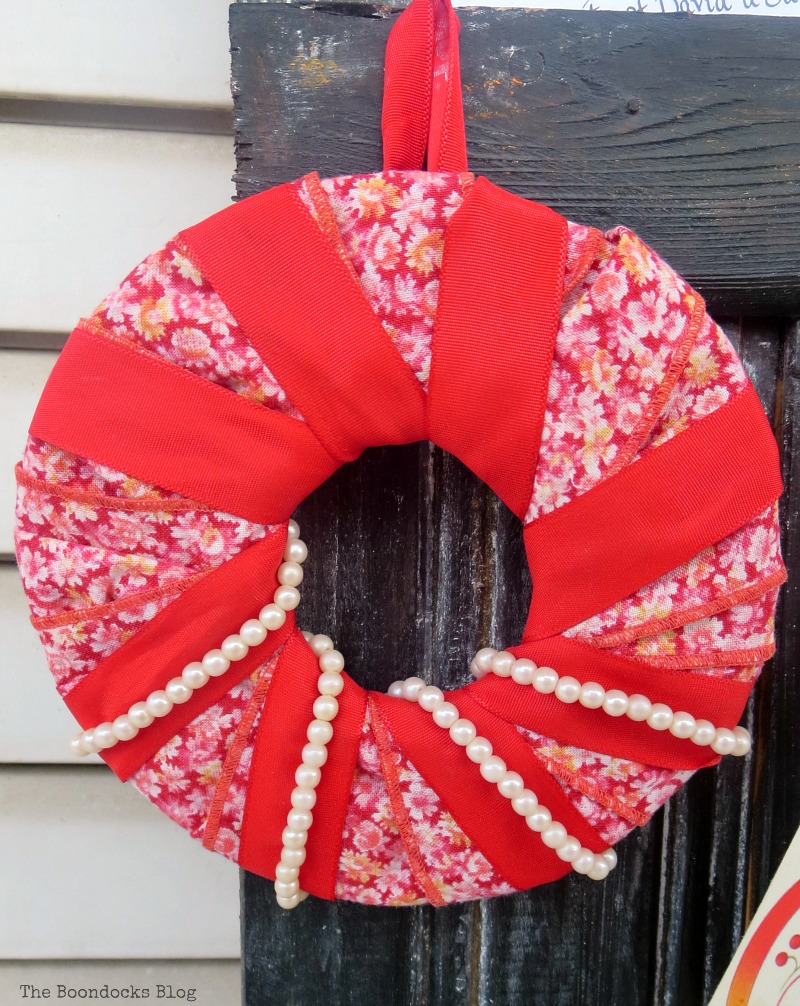 A red and floral handmade ornament, A Display for Christmas Cards and Ornaments www.theboondocksblog.com