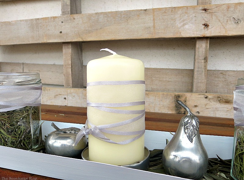 The candle wrapped in grey ribbon, Easy Green Christmas Centerpieces www.theboondocksblog.com