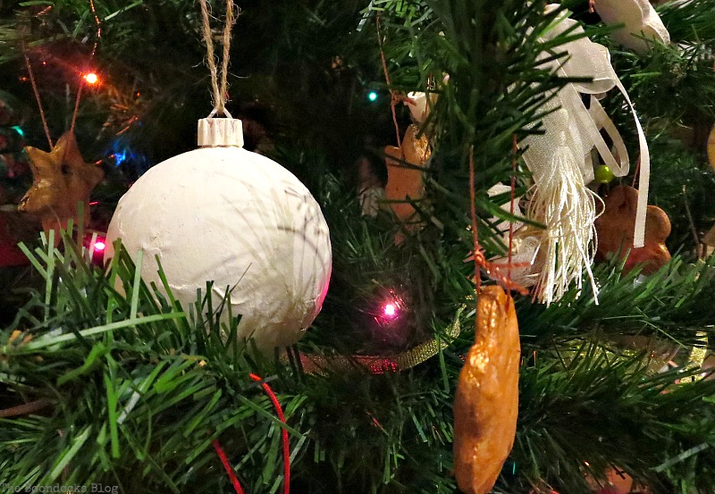White globes with twinkling lights, How to Upcycle your Christmas Tree on the cheap, www.theboondocksblog.com