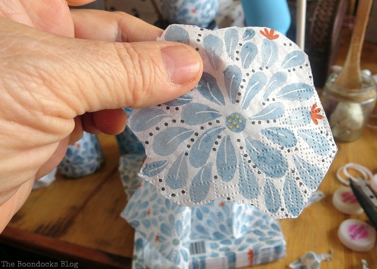 Close up of a cut flower shape from the napkin.