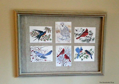 Christmas cards arranged in a frame