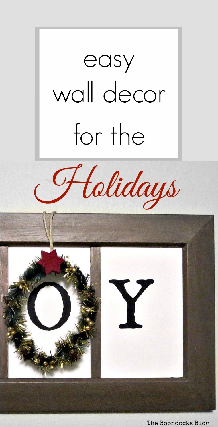 Upcycling a plastic picture frame to make it look rustic wood and adding a printable. #holidaysign #upcycledprictureframe #easycraft #christmascraft #printables #JOY How to Make Easy Wall Decor for the Holidays www.theboondocksblog.com