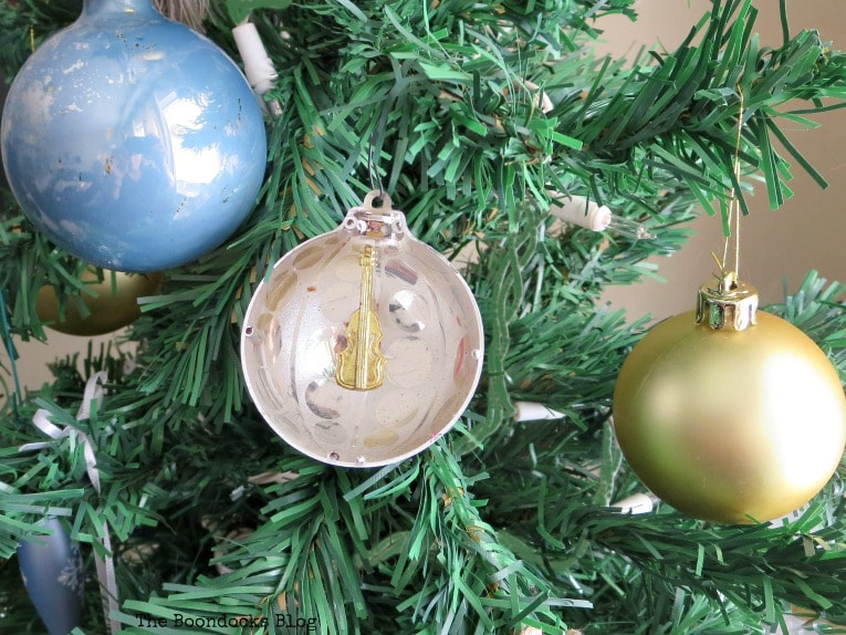 Blue, gold and half globe ornaments, The Most Affordable Way to Decorate a Christmas Tree, www.theboondocksblog.com