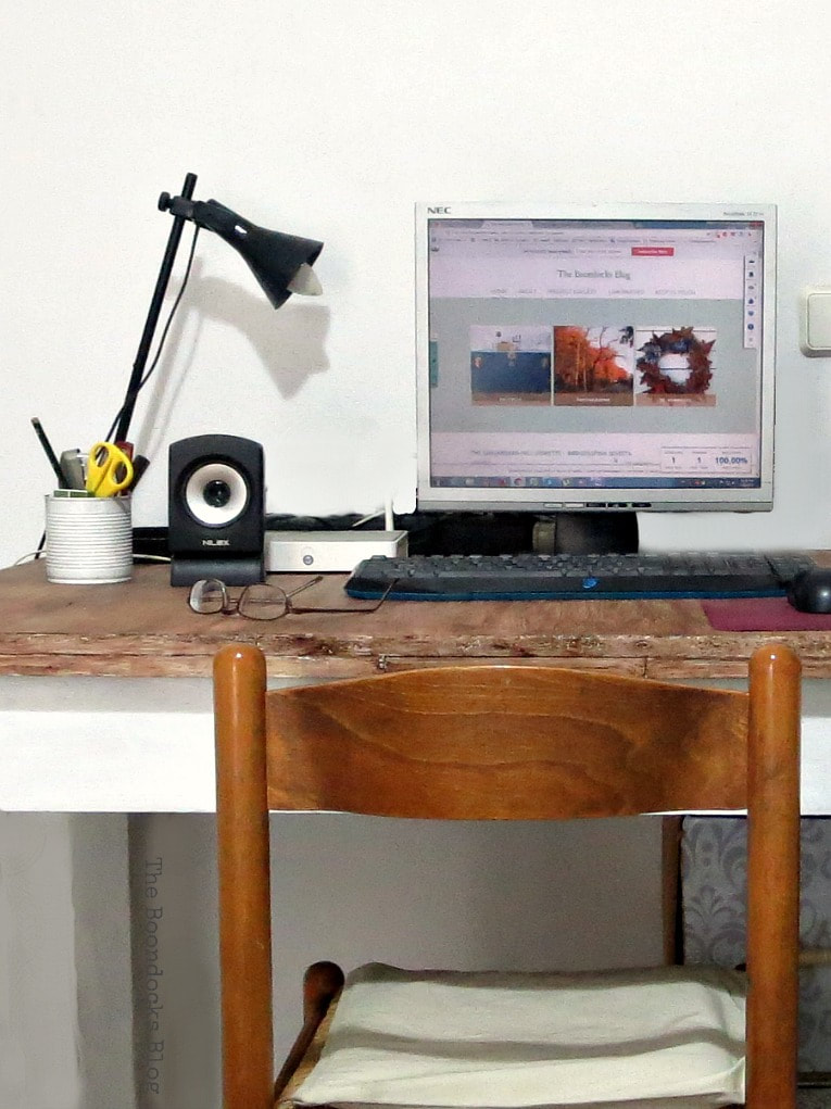 Close up of wooden desk and chair.