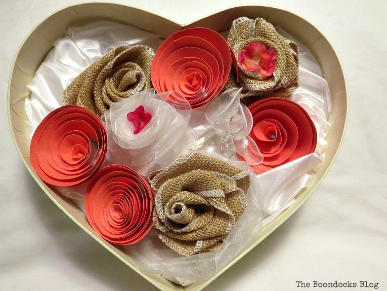 spiral flowers placed into heart shaped box, A Heart Shaped Box for Valentine's Day Crafting www.theboondocksblog.com