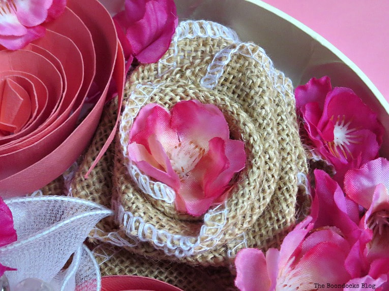 Faux flower placed inside burlap rose, A Heart Shaped Box for Valentine's Day Crafting www.theboondocksblog.com