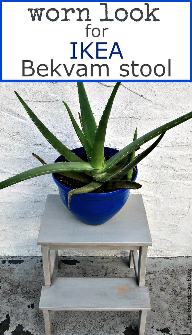 A blue planter on top of the finished Ikea Bekvam step stool, with text overlay "worn look for Ikea Bekvam stool."