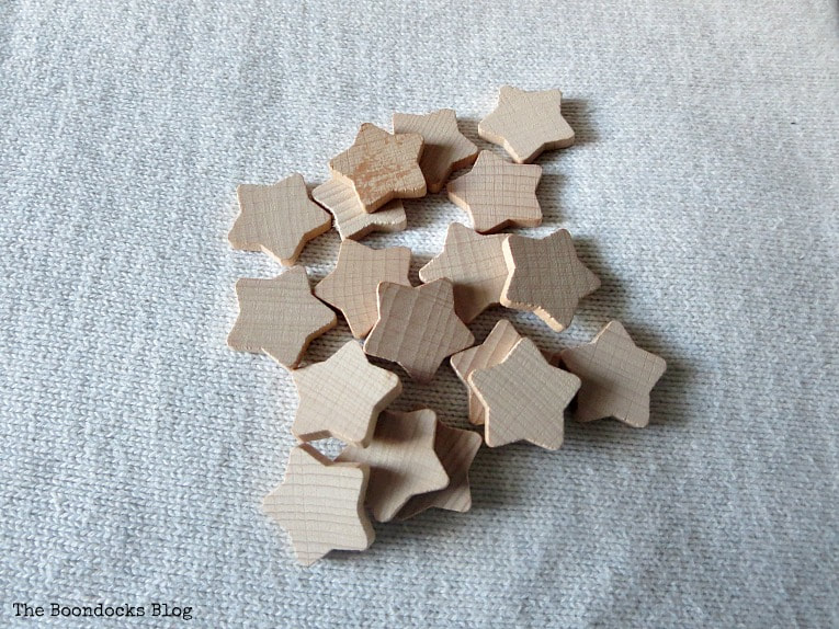mini wood stars, How to Make a Christmas Wreath with Metallic Accents, www.theboondocksblog.com