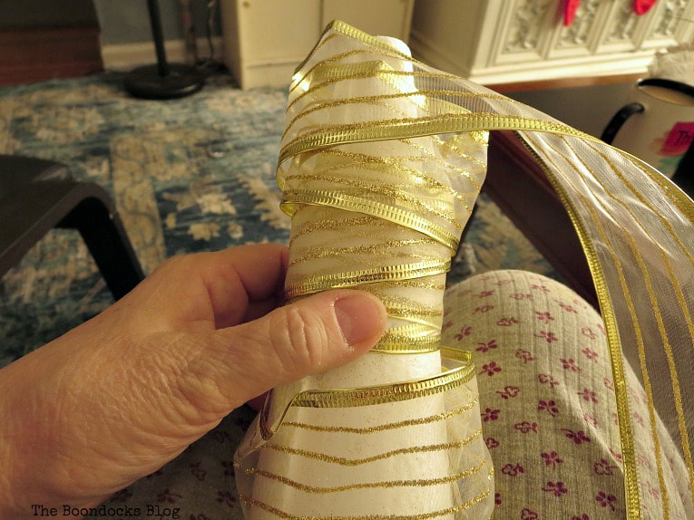 Gold thick ribbon wrapped around the foam, How to Make a Simple Mini Christmas Tree with Ribbon www.theboondocksblog.com