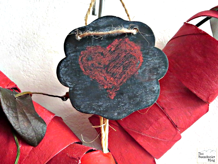 A mini-chalkboard sign added to the top of the heart wreath.