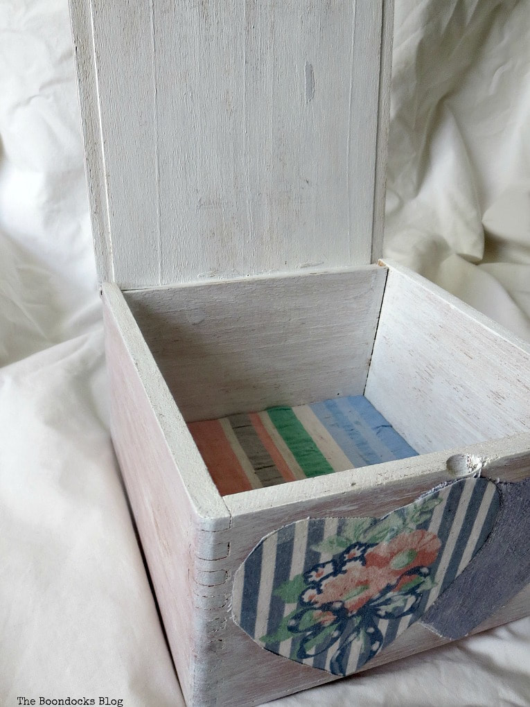 Wooden box embellished with repurposed fabric.