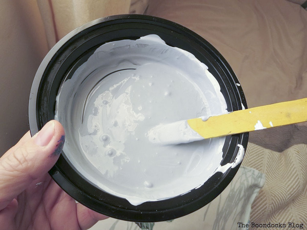 Mixing the blue paint, How to Re-Invent your Old Coffee Table With Paint www.theboondocksblog.com