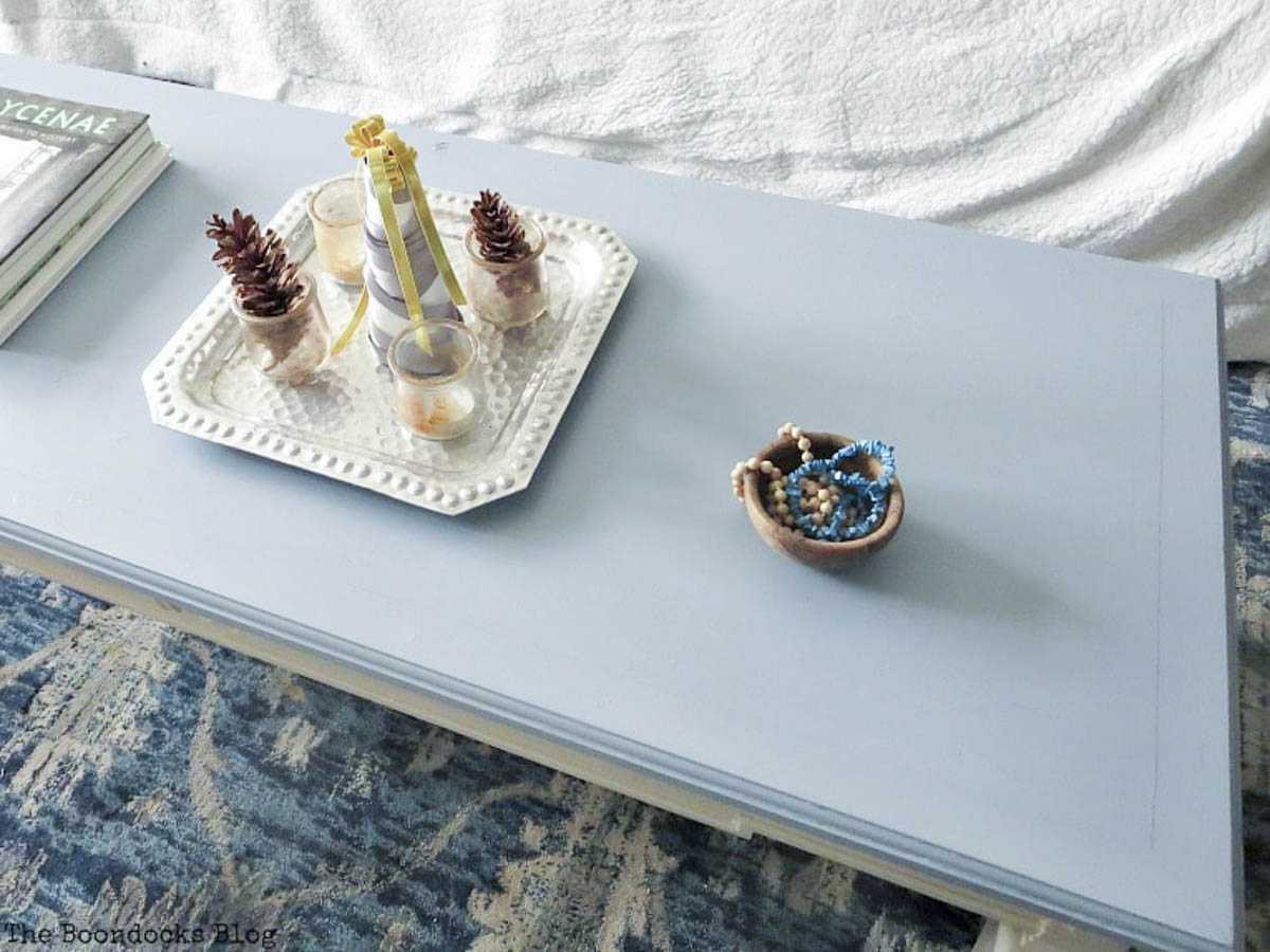 Finished wood table with blue top and beige bottom, www.theboondocksblog.com