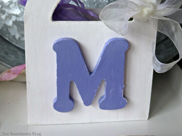Wooden gift bag painted white, with purple painted letter, Gift Giving with Pretty Wooden Gift Bags www.theboondocksblog.com