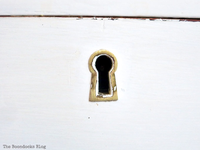 cleaned key hole, How to Make your Dresser Sparkle with Age www.theboondocksblog.com